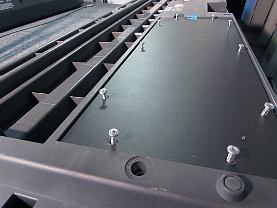 Speaker compartment cover screws